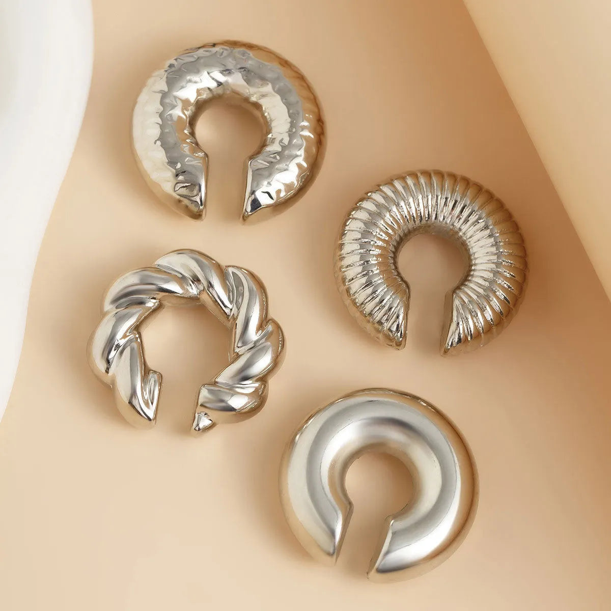 Geometric gold and silver ear clips for women without pierced ears