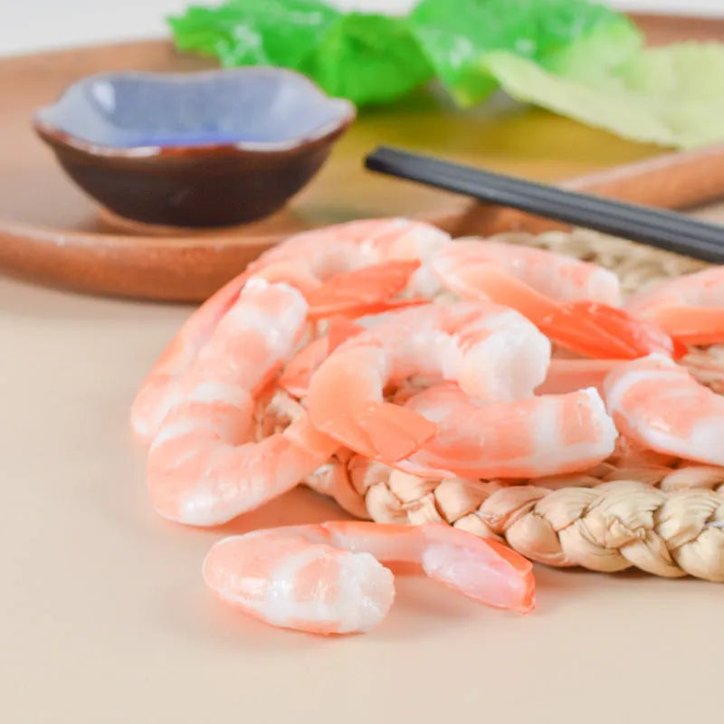 PVC injection moulded shrimp-shaped keychain with door buckle, 1.5cm thick, on a white background.