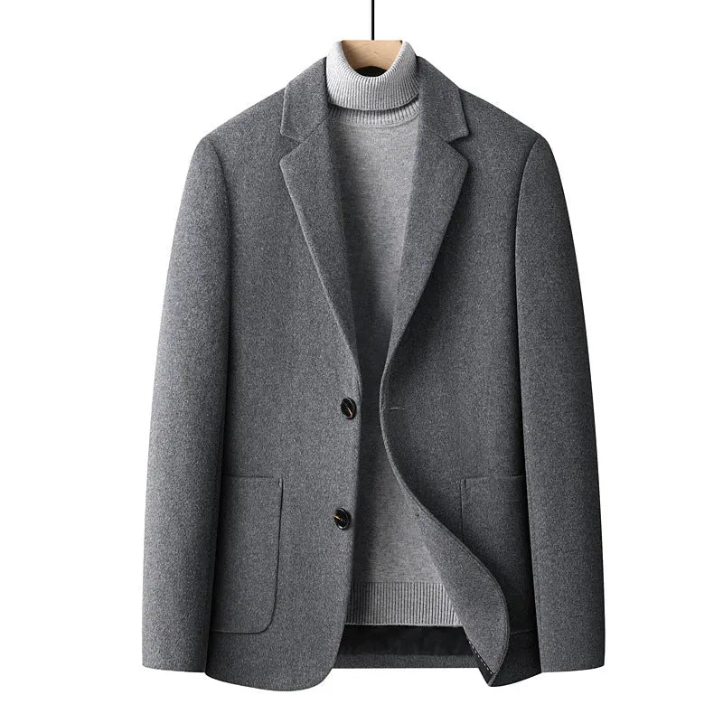 Men's slim fit wool blend suit jacket in a solid colour on a hanger.