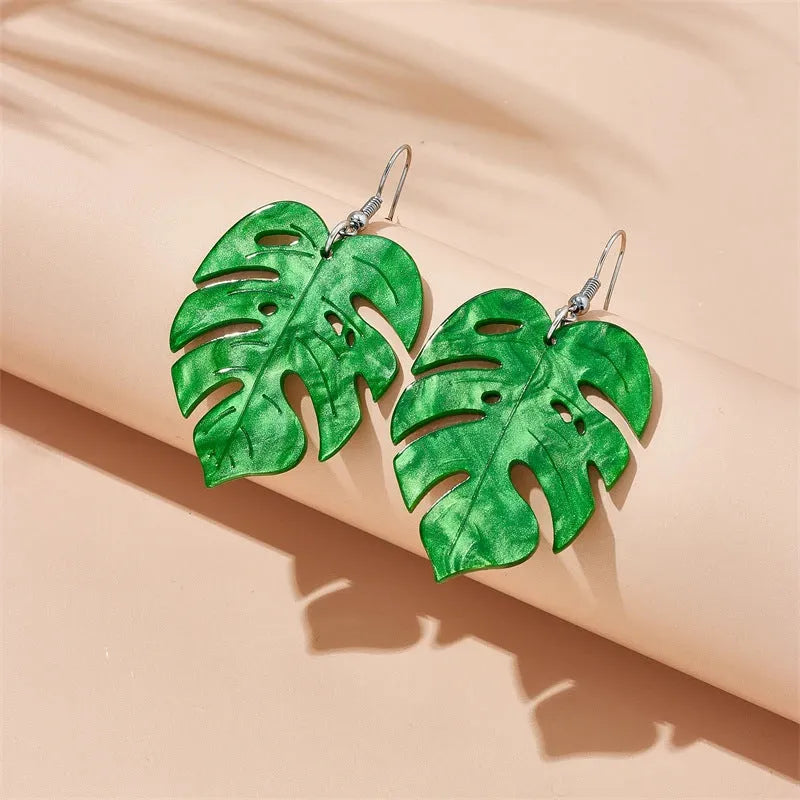 Colourful coconut artocarpus drop charm earrings on an alloy ear hook, shown in one of five style colours.