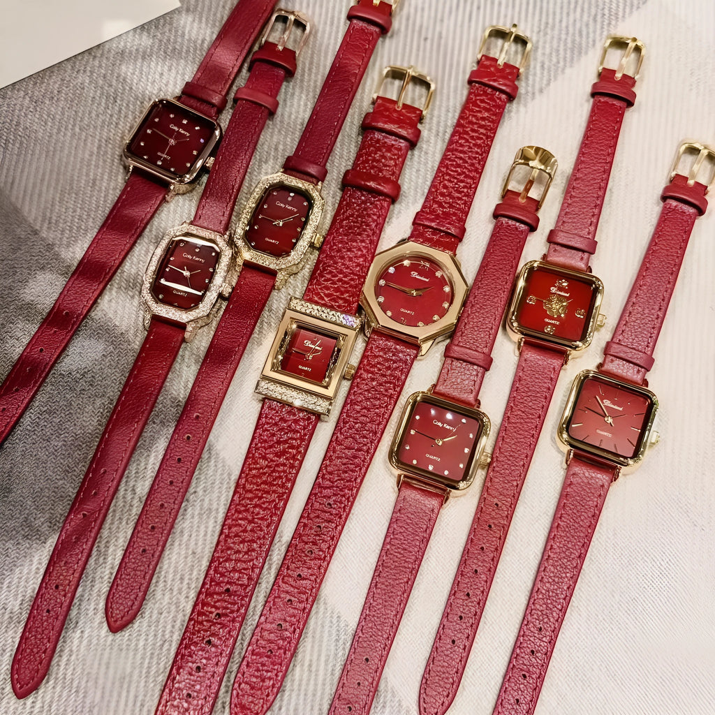 Red dial women's alloy watch with Chinese style decorative design on wrist.