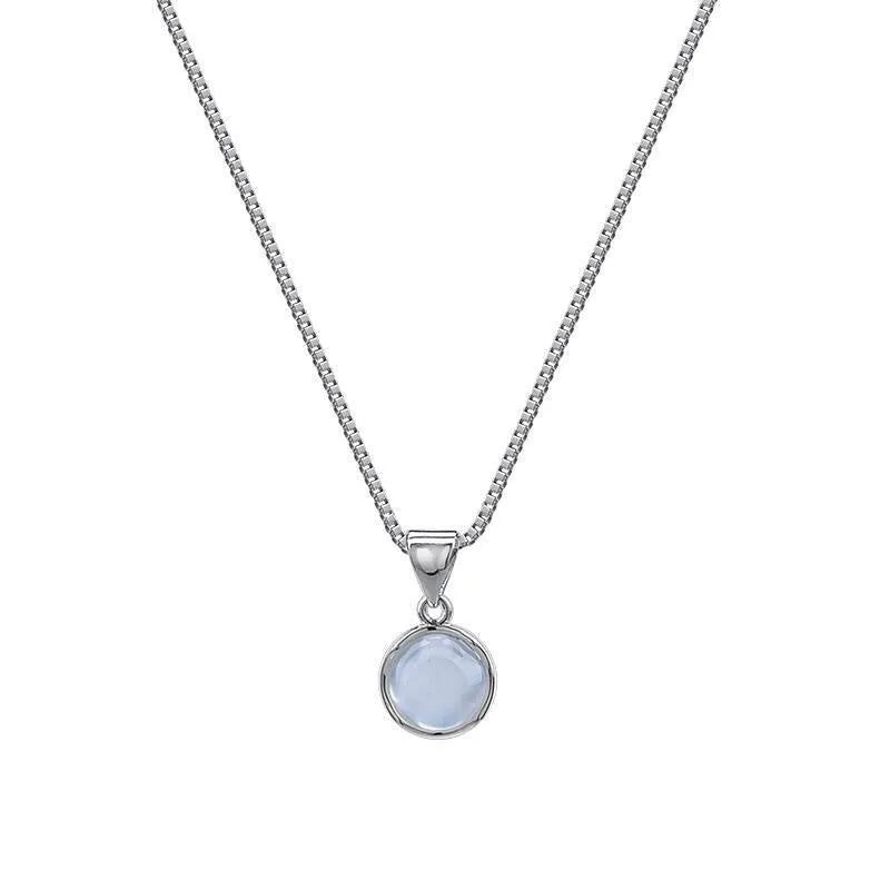 Women's oval artificial crystal pendant necklace with eight-point star detail on adjustable box chain