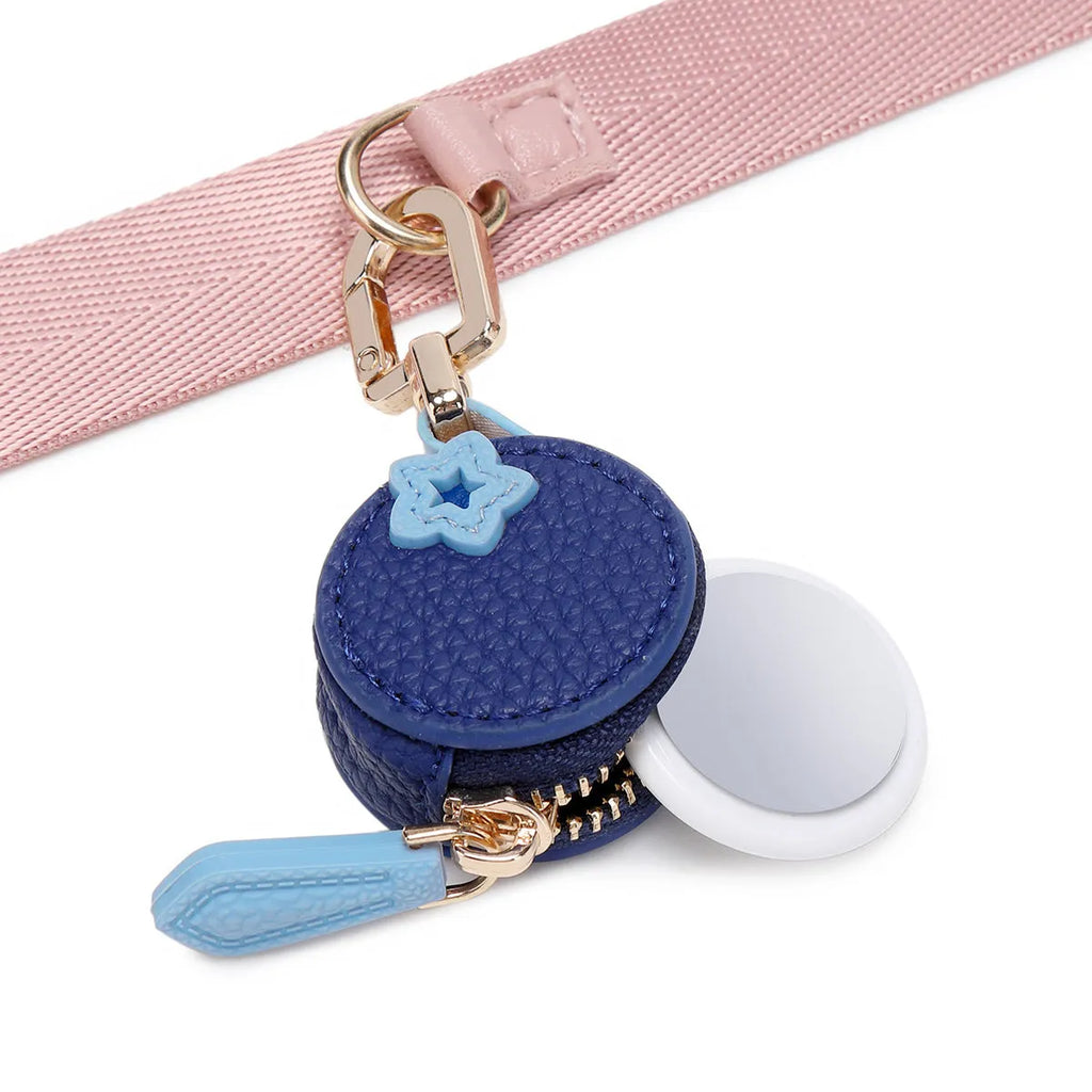 Mini PU leather coin bag keychain in cherry red colour, shown attached to a keyring.