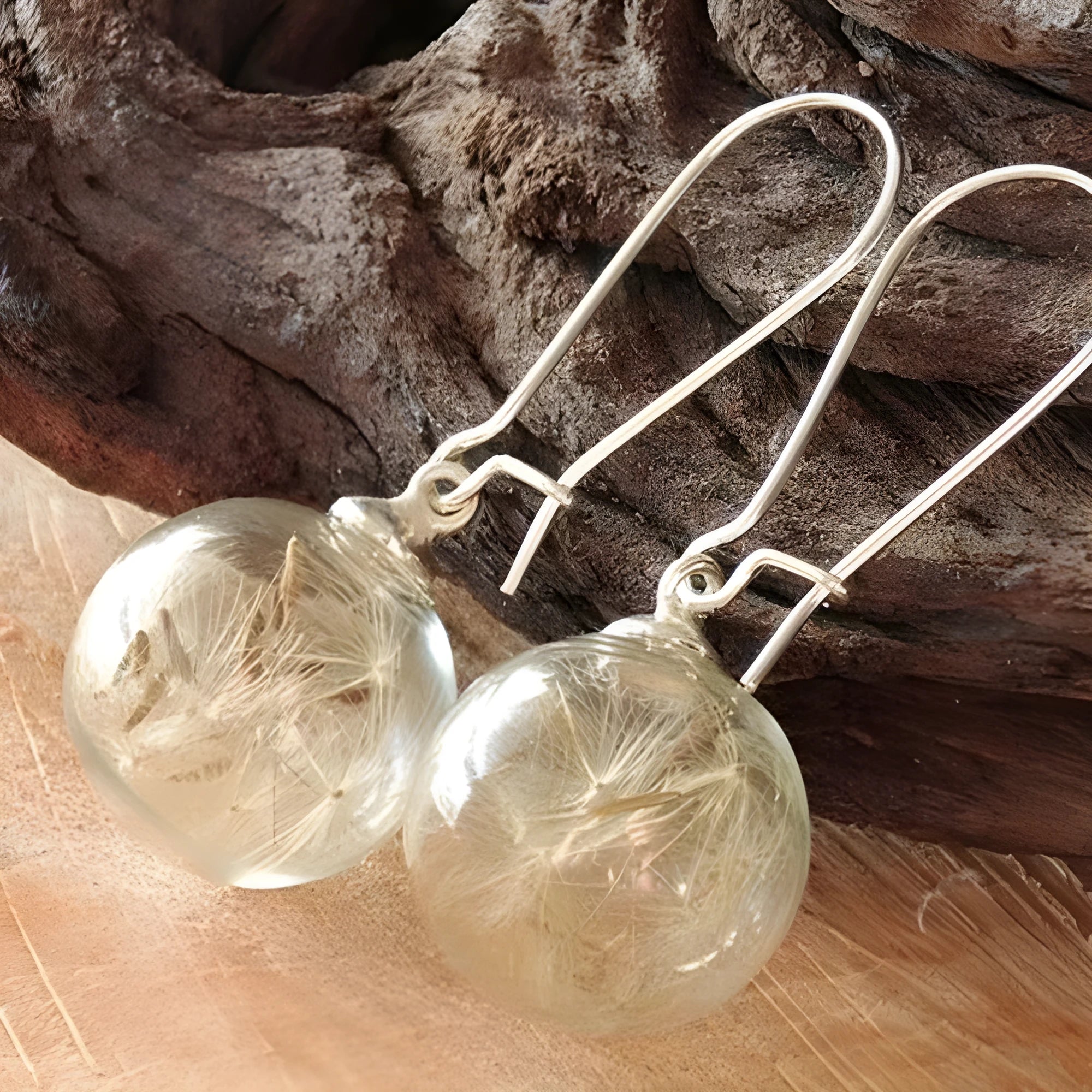 Transparent glass dandelion seed earrings with silver hooks in 16mm ball size