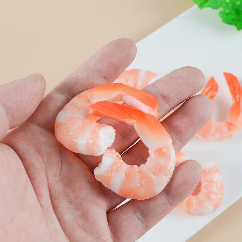 PVC injection moulded shrimp-shaped keychain with door buckle, 1.5cm thick, on a white background.