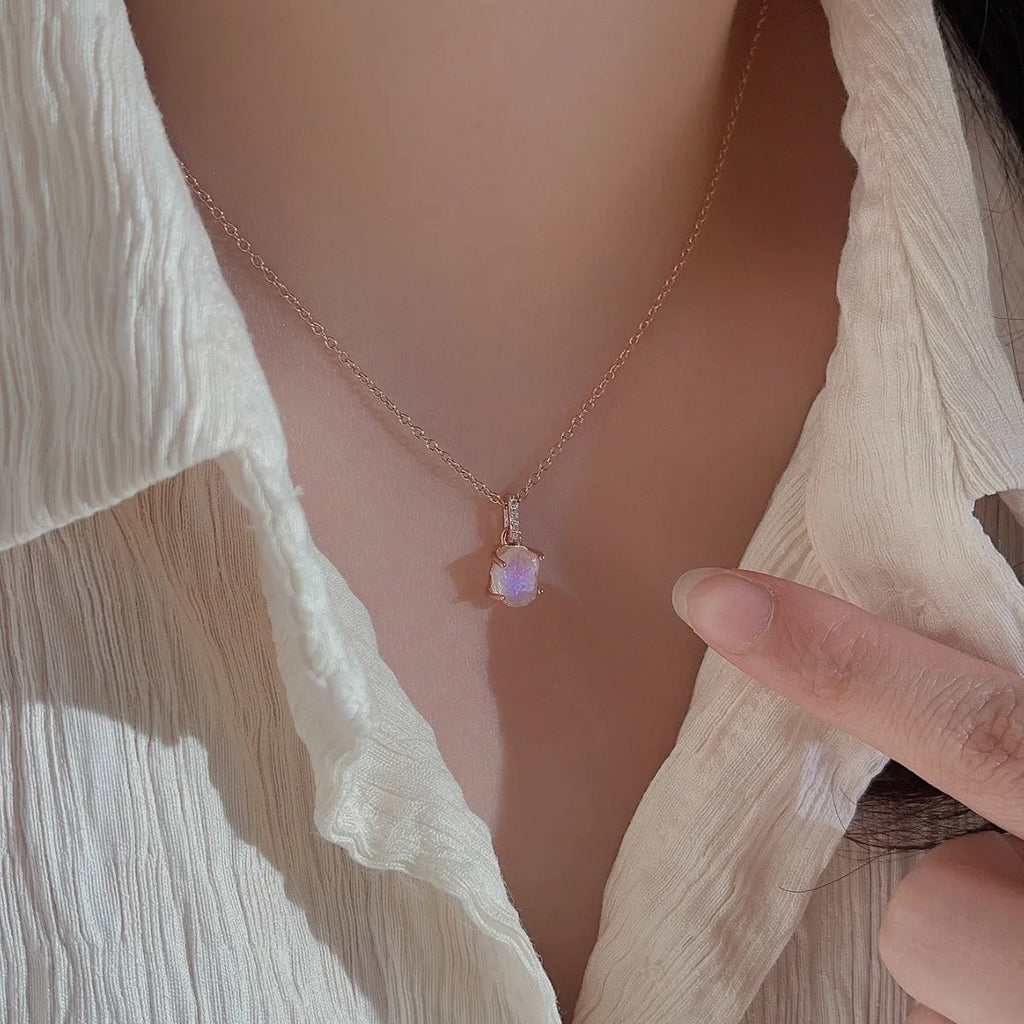 Sterling silver geometric necklace with moonstone pendant on adjustable curb chain