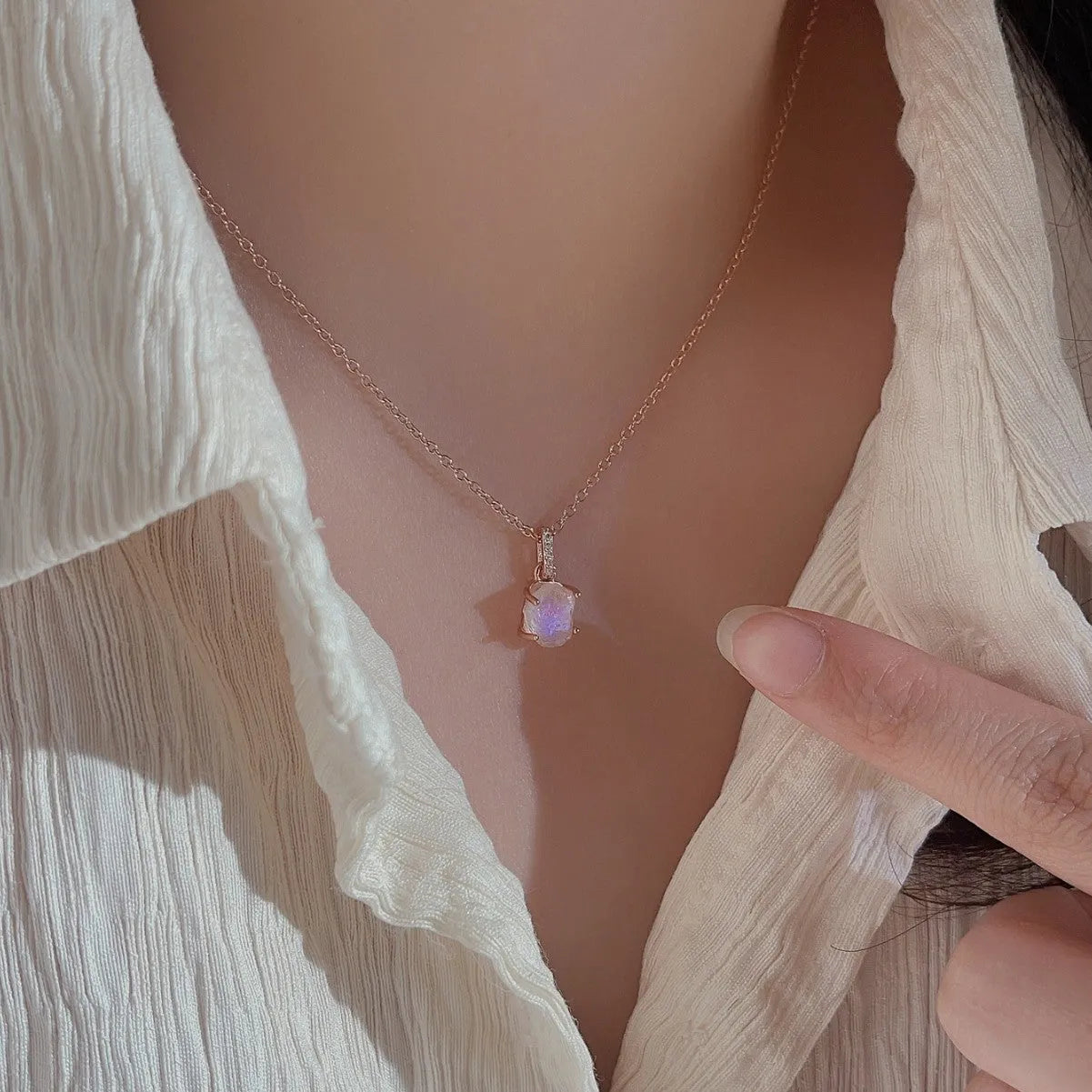 Sterling silver geometric necklace with moonstone pendant on adjustable curb chain