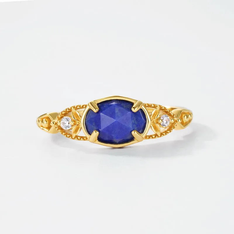 Japanese geometric lapis lazuli ring with silver setting and ellipse shape