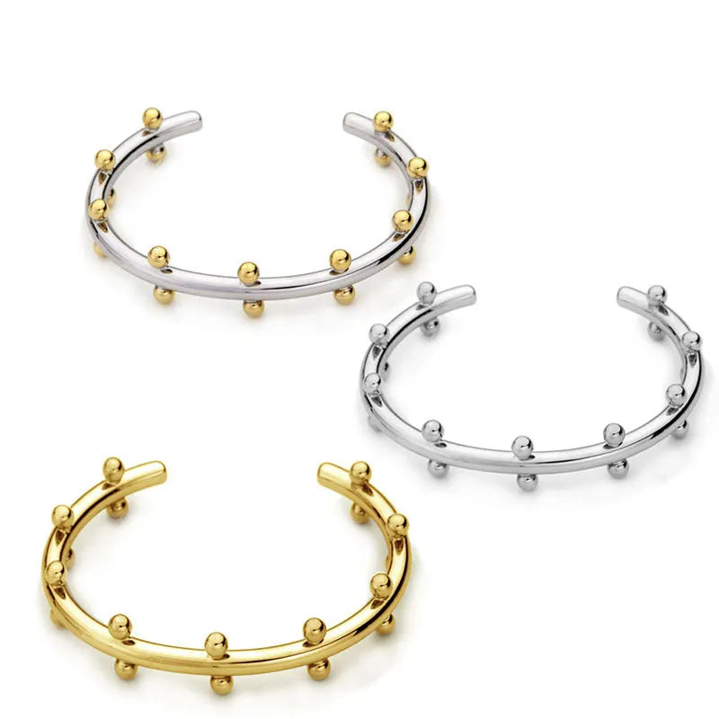 Stainless steel personality texture rivet bean beads bracelet with C-shaped design in gold finish