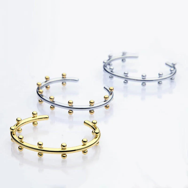 Stainless steel personality texture rivet bean beads bracelet with C-shaped design in gold finish