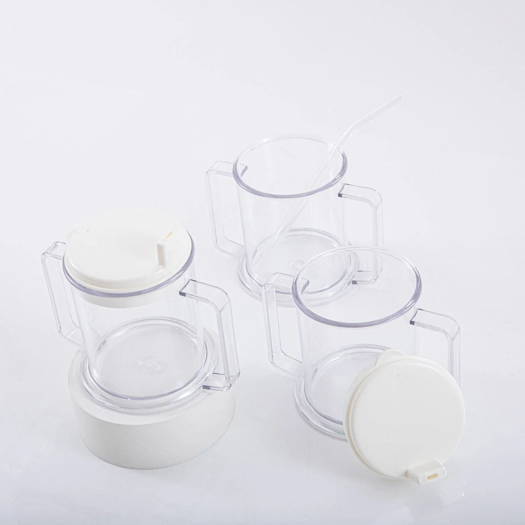 Transparent spill-proof drinking cup with straw lid showing modern minimalist design