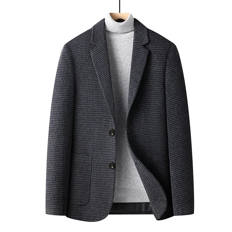 Men's slim fit wool blend suit jacket in a solid colour on a hanger.