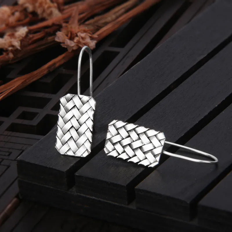 Silver geometric diamond plaid woven drop earrings, 17.5mm x 11mm, made from 925 sterling silver.
