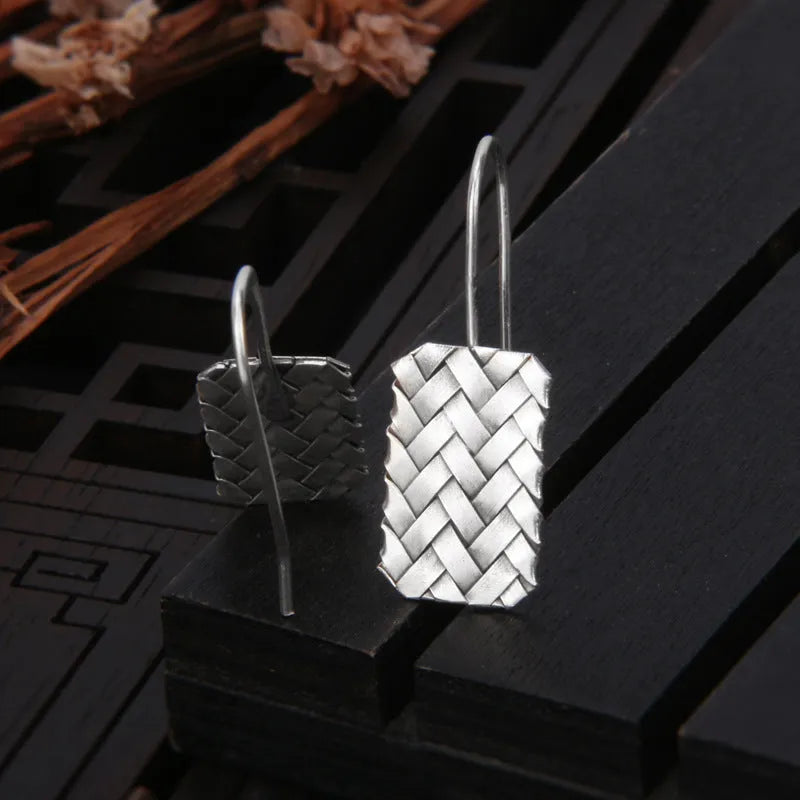 Silver geometric diamond plaid woven drop earrings, 17.5mm x 11mm, made from 925 sterling silver.