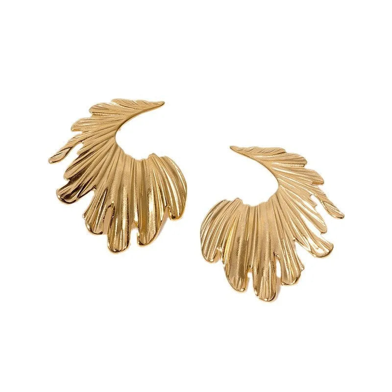 A pair of stainless steel earrings in a leaves shape with a gold electroplated finish.