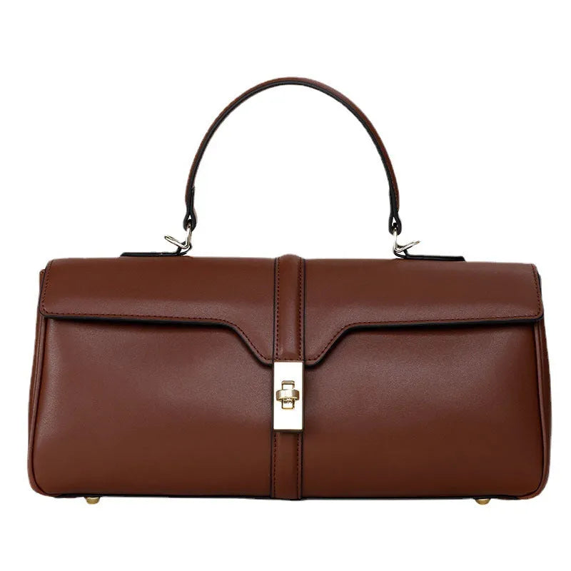 Women's cylindrical cowhide messenger bag in European-American retro style with organiser compartments
