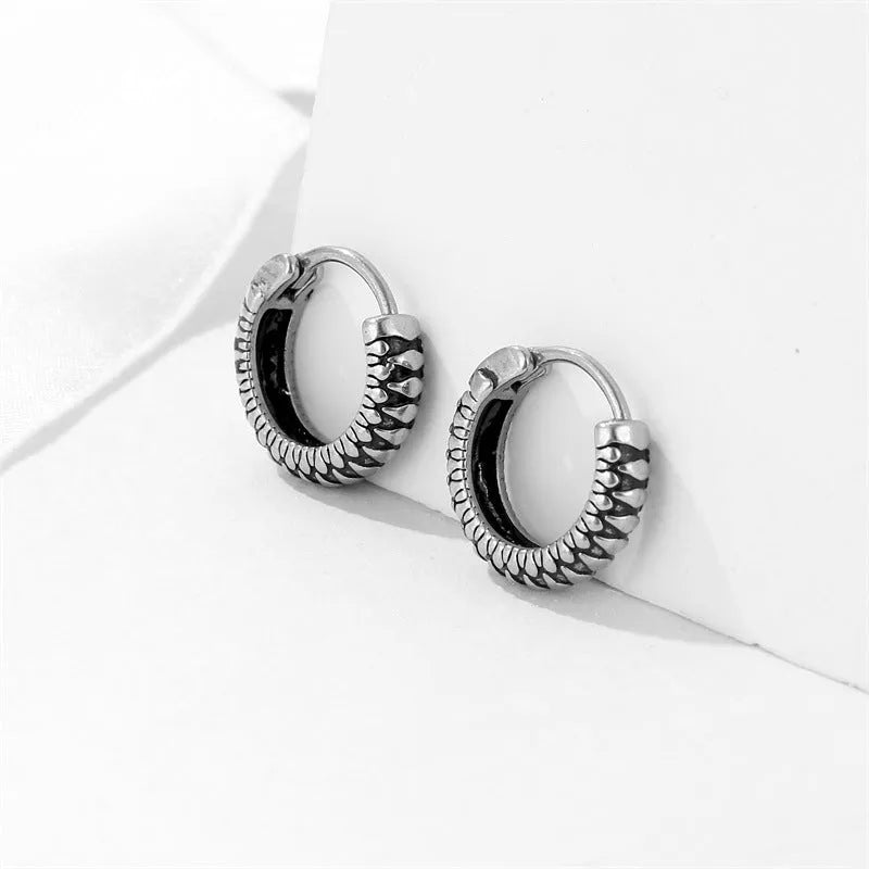 Silver retro twist geometric stripe earrings made from stainless steel with a sporty style.