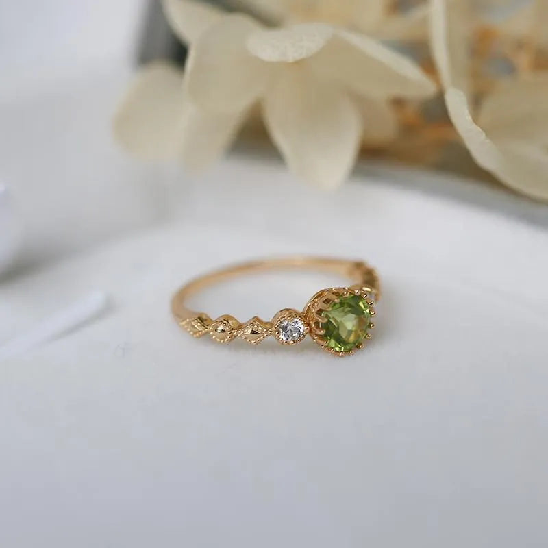 Japanese style copper ring with geometric quadrilateral design and imitation peridot appearance