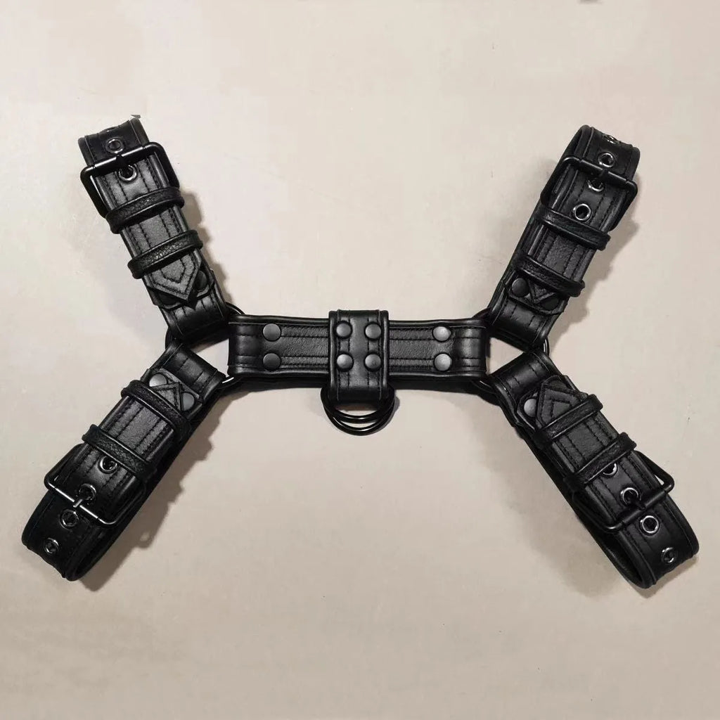Black leather chest bondage strap with metal buckle adjustment for adults