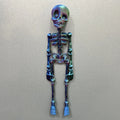 3D-printed PLA skull model Halloween fridge magnet ornament in luminous green colour.