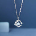 Women's geometric tree and bird pendant necklace with adjustable chain in blue eucalyptus colour