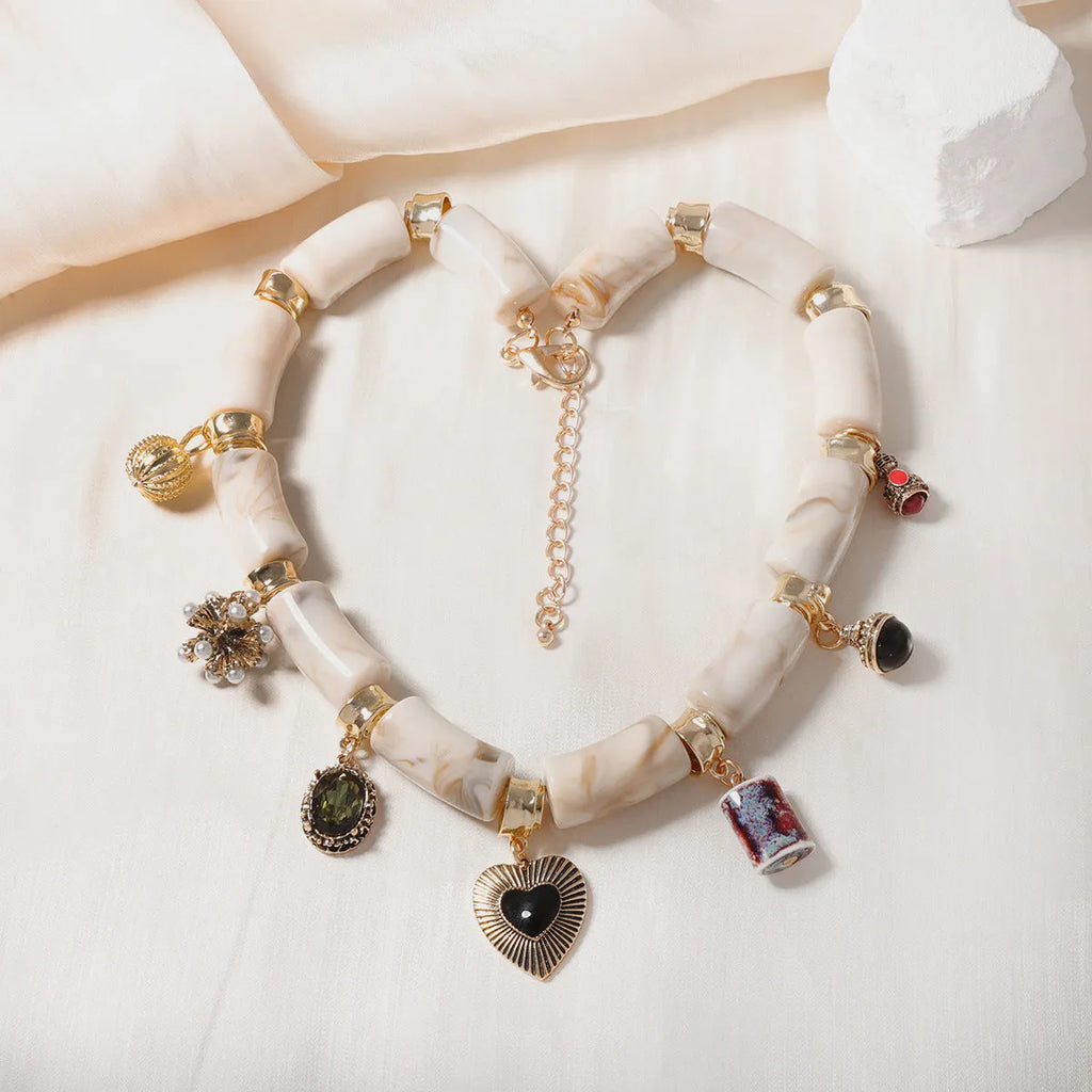 Heart-shaped bamboo pendant necklace with electroplated finish on plastic resin