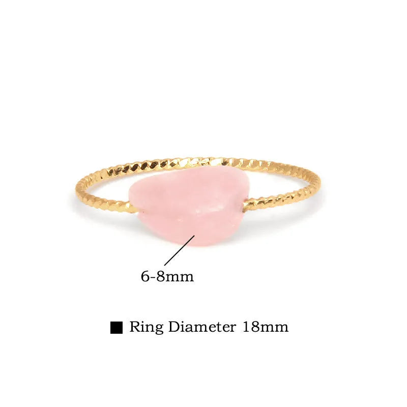 Close-up of a women's geometric agate ring showing its original design and coloured stone.