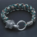 Polished stainless steel wolf head bracelet with camouflage colour finish showing detailed animal modelling