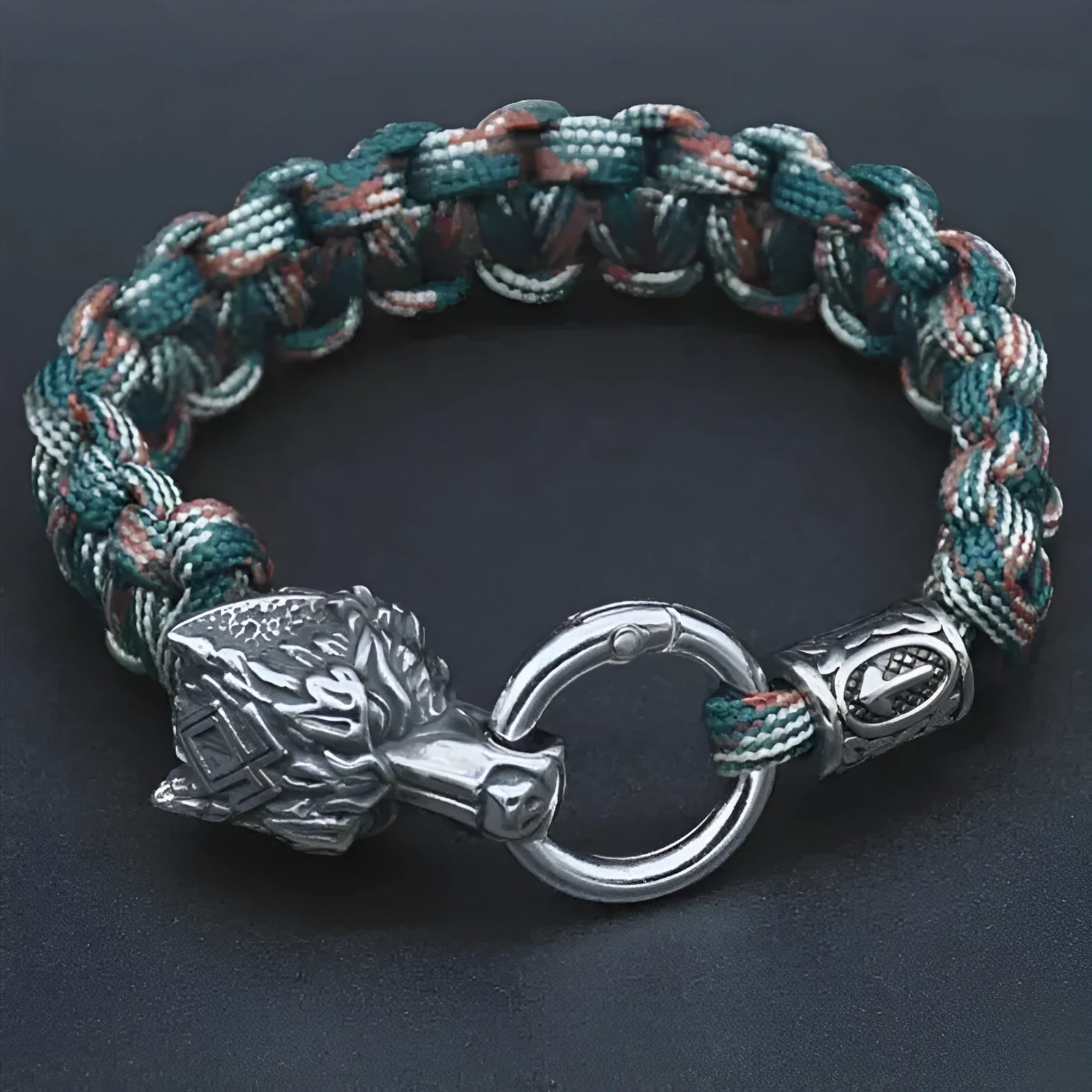 Polished stainless steel wolf head bracelet with camouflage colour finish showing detailed animal modelling