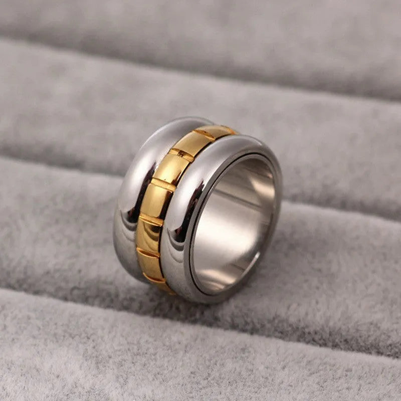 Gold titanium steel knuckle ring with ultra-wide band and rotating tail mechanism
