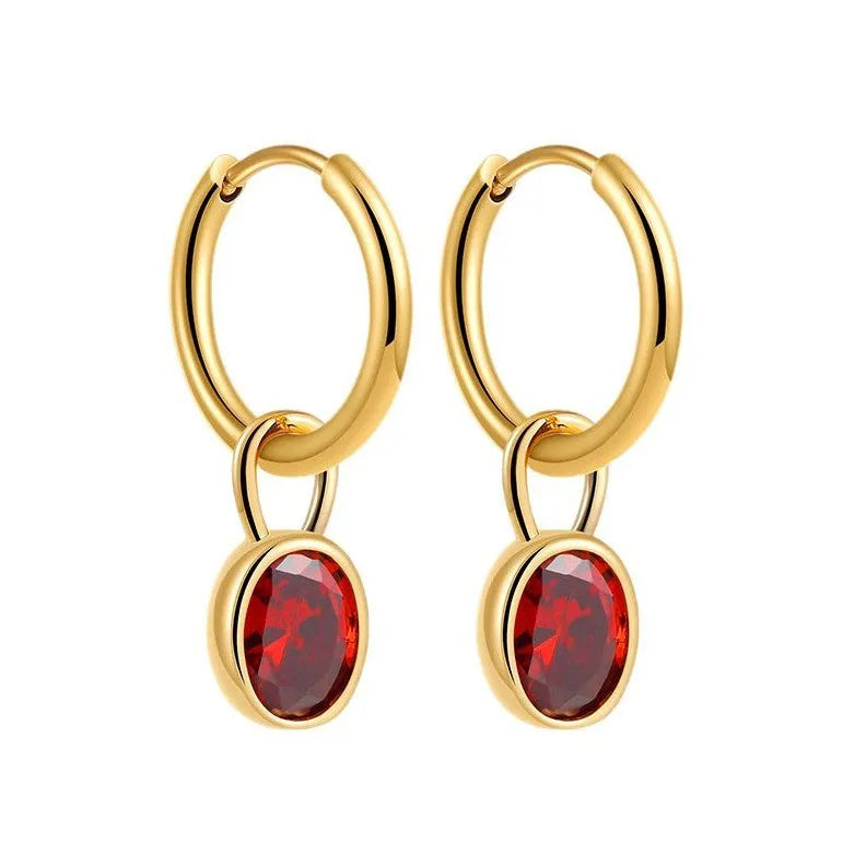 Women's oval-shaped retro zircon earrings in copper, shown in emerald green colour.