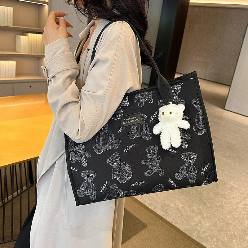 Women's printed canvas tote bag with rhombus pattern and sandwich pockets in black colour option