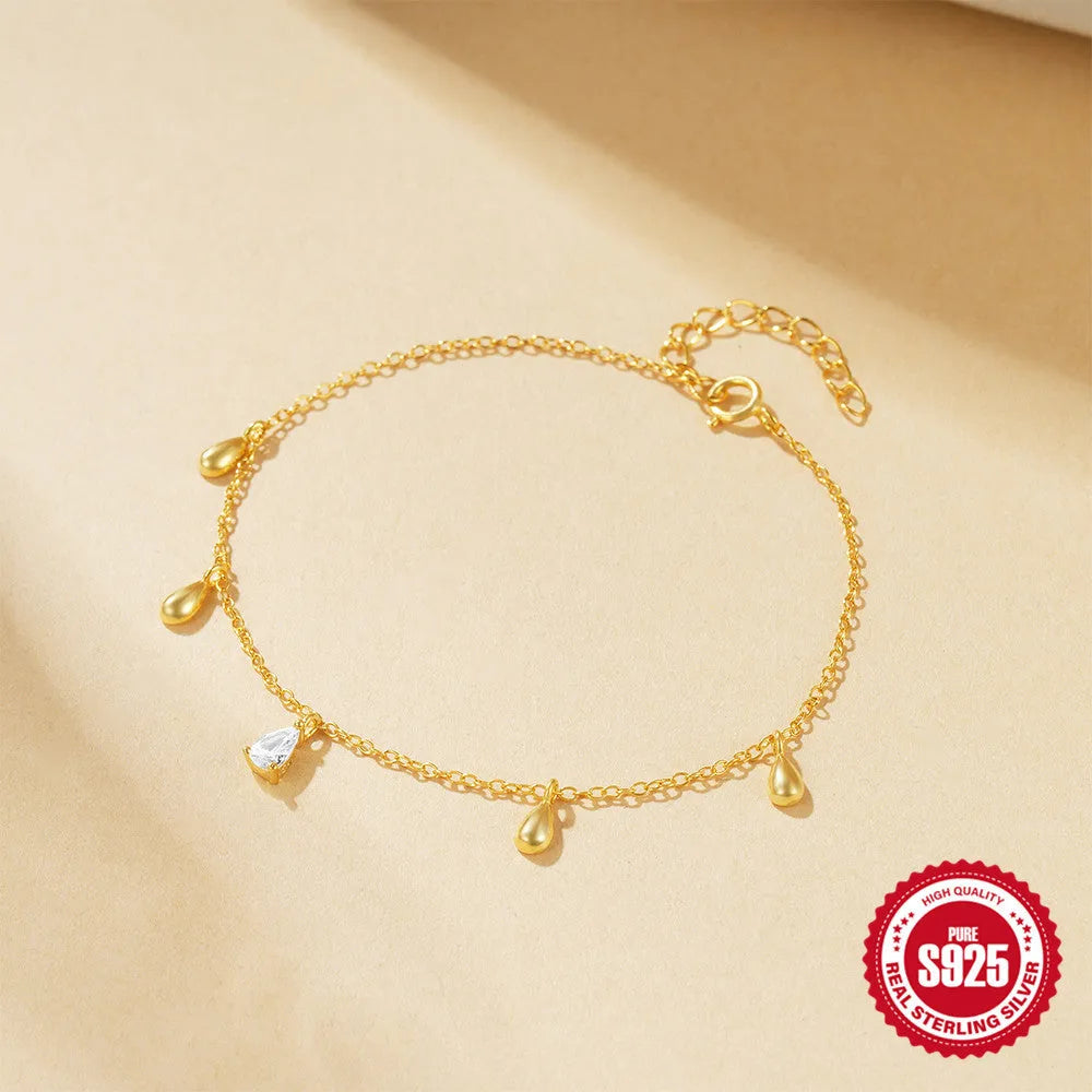 Gold colour S925 sterling silver bracelet with geometric water drop diamond pendant for women