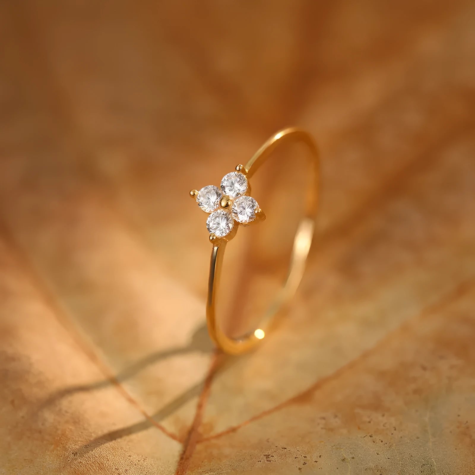 Gold plated diamond four-leaf clover ring for women, silver base, closed mouth setting, white gold colour
