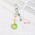 Mobile phone charm keychain with fruit designs including apple and strawberry patterns
