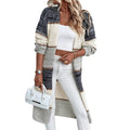 Grey striped knitted women's cardigan with long sleeves and loose fit