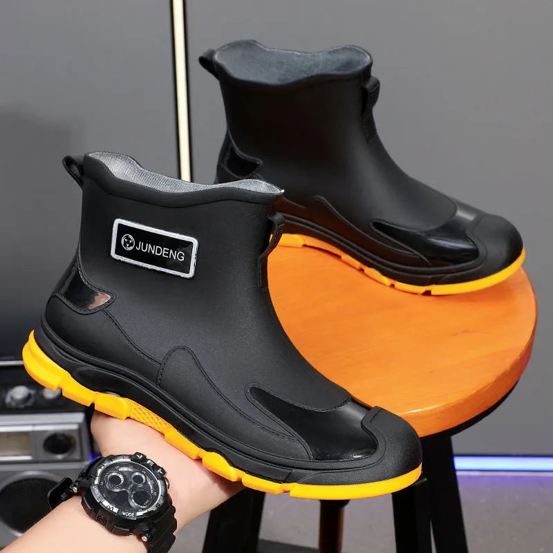 Korean style PVC waterproof boots with low tube design and integrated moulded sole in black colour