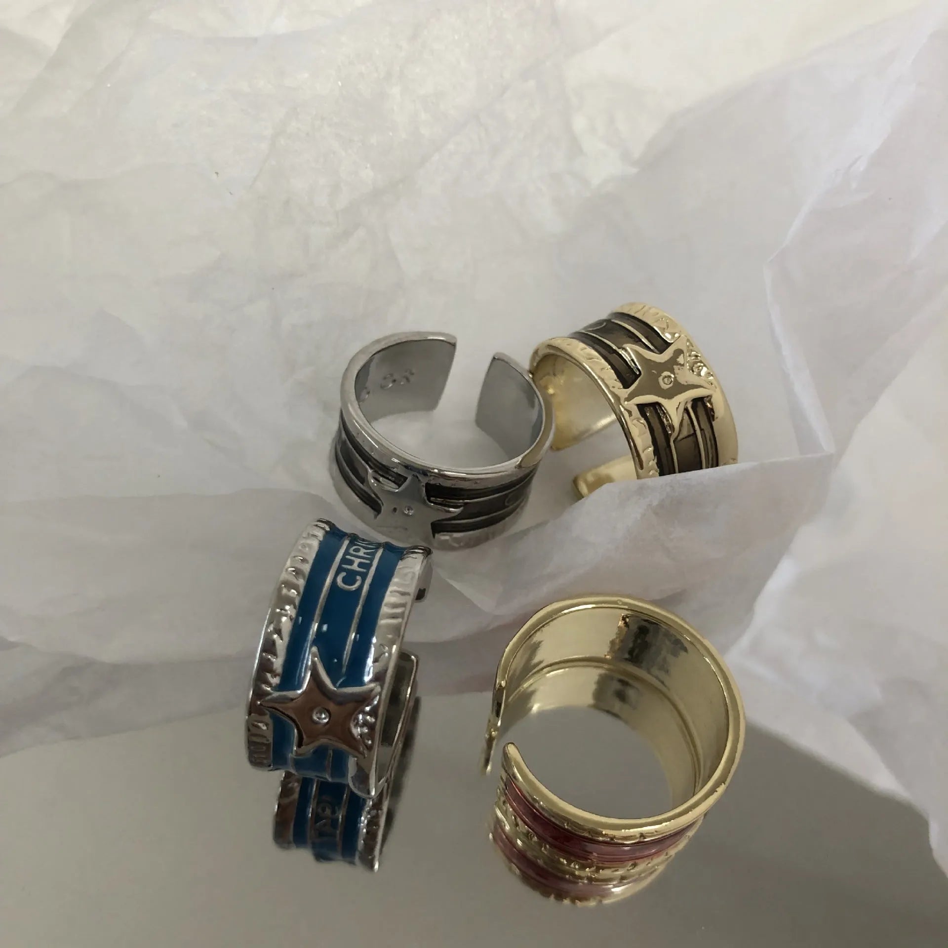 Adjustable copper ring with a geometric line pattern and retro distressed finish in four colour options.