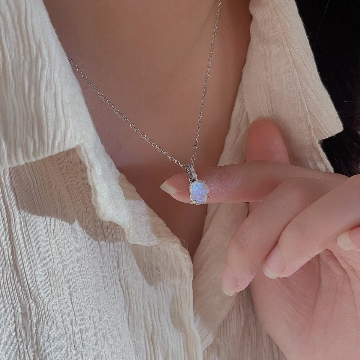 Sterling silver geometric necklace with moonstone pendant on adjustable curb chain