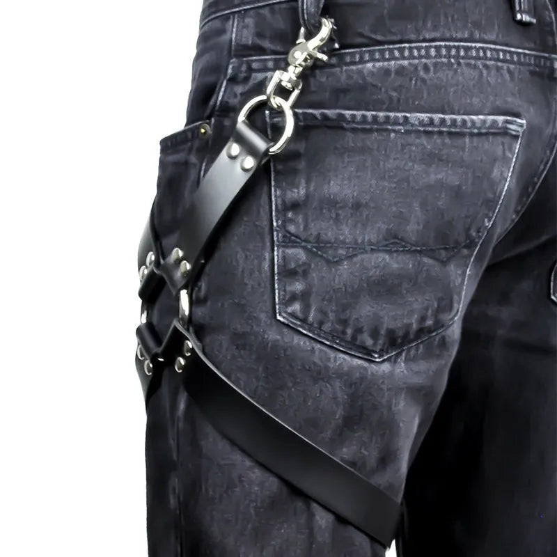 Black PU leather leggings with an elasticated waistband laid flat.