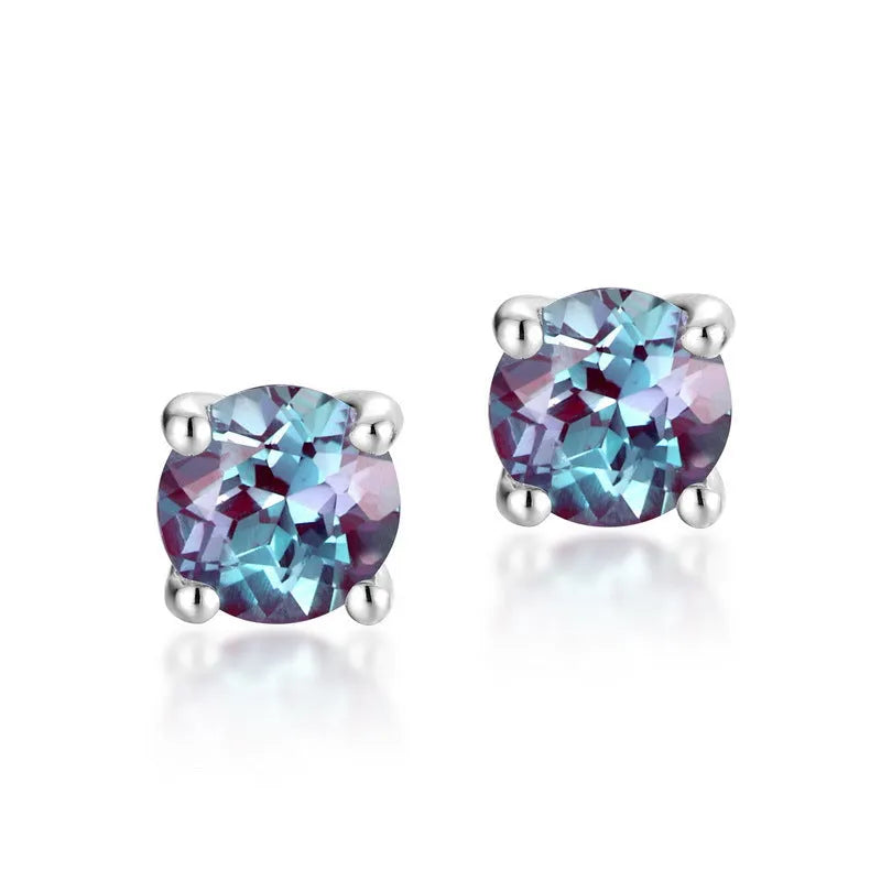 Simple geometric sterling silver stud earrings with a round cultivated Alexandrite stone.