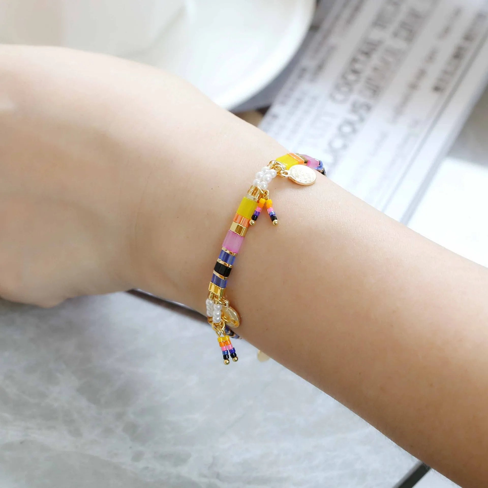 Women's handmade imitation pearl beaded bracelet in a European and American style, showing one of six available colour options.