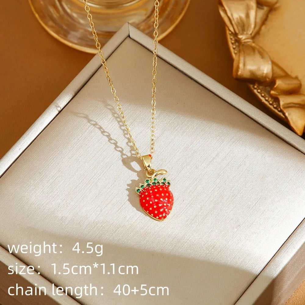 Titanium steel necklace with an indie-style cherry, strawberry, and pepper pendant on an O-ring chain.
