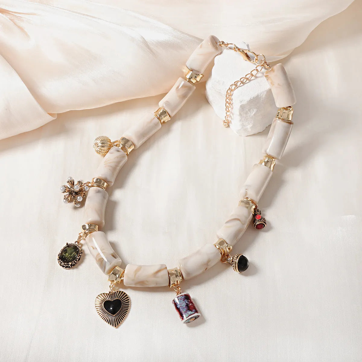 Heart-shaped bamboo pendant necklace with electroplated finish on plastic resin