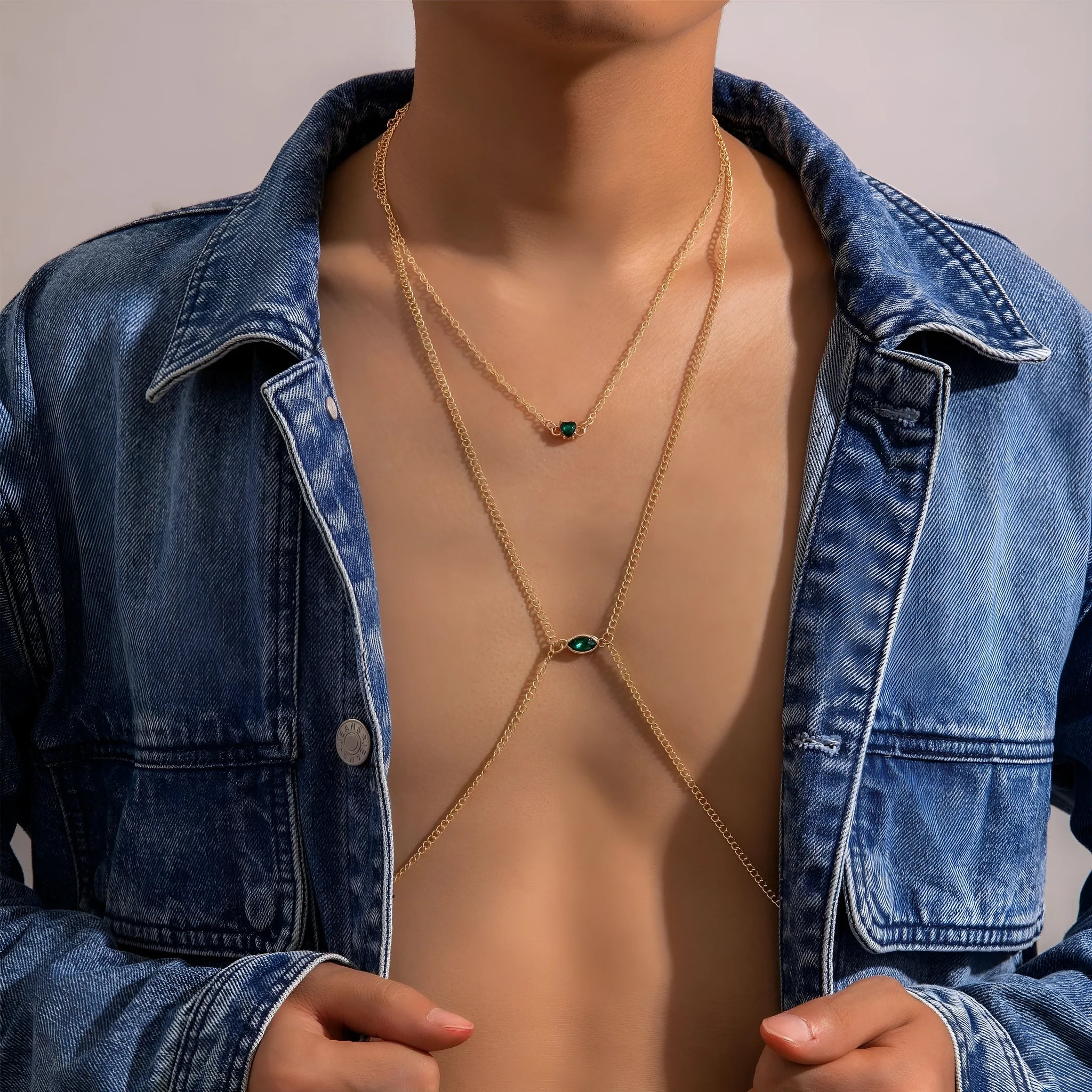 Men's simple gold-toned alloy body chain necklace with electroplated 25729 gold finish on a plain background.