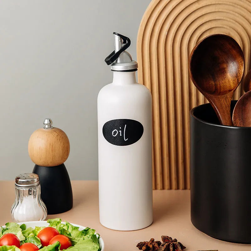 Ceramic kitchen oil pot with sealed spout and conical funnel for cooking oil storage