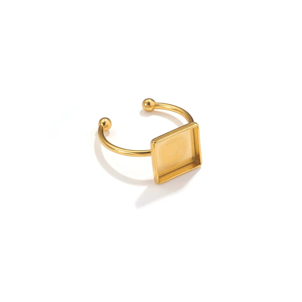 Stainless steel golden electroplated ring setting with totem pattern for DIY jewellery making.