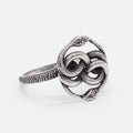 A steel-coloured titanium steel ring featuring a detailed double snake design in a retro style.