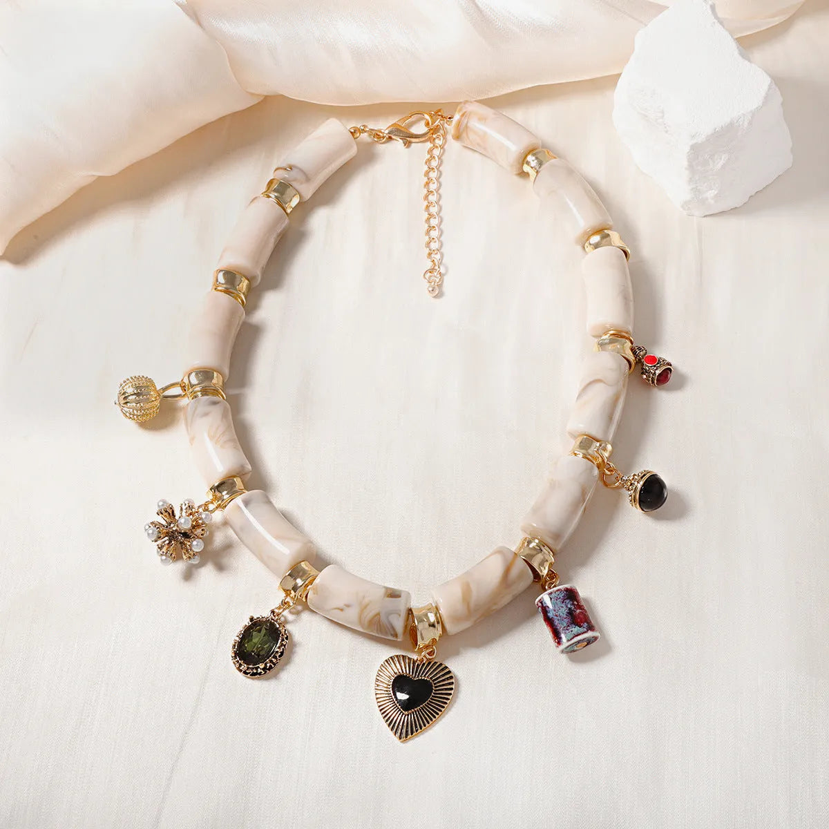 Heart-shaped bamboo pendant necklace with electroplated finish on plastic resin