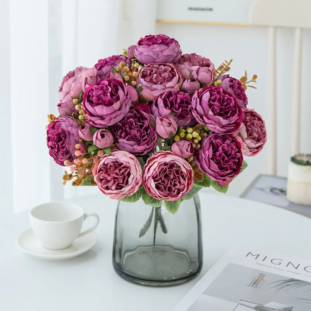 Artificial silk peony bouquet with long stem on white background